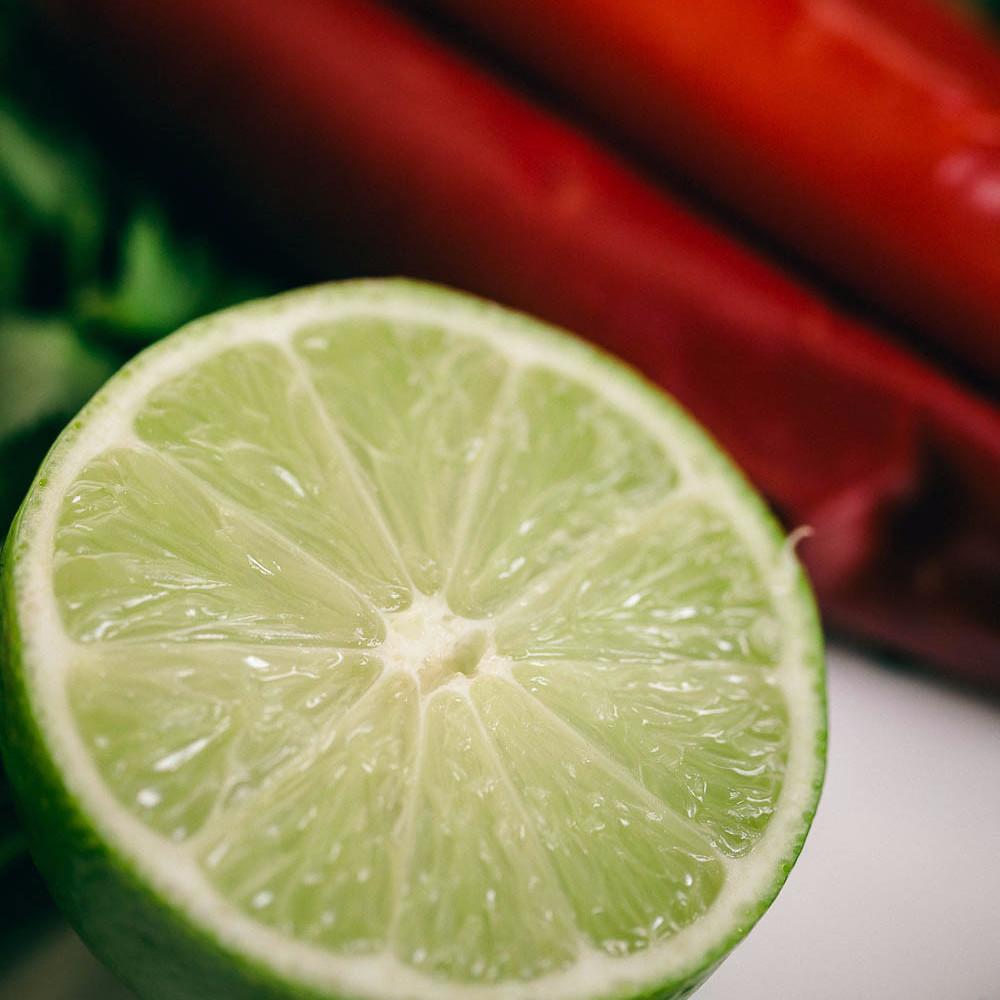 Dinneronthetable-6224_89a514f4-2efe-4459-85a2-73d002ec7a0a Image of lime and chillis